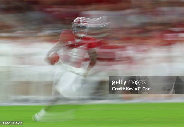 Jalen Milroe of the Alabama Crimson Tide rushes against Texas A&M during the first half at Bryant-Denny Stadium on October 08, 2022 in Tuscaloosa,...