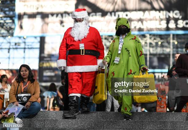 Cosplayers seen as Santa during day 4 of New York Comic Con on October 09, 2022 in New York City.