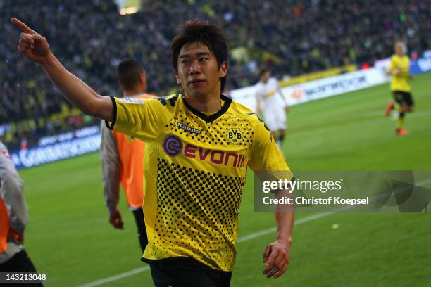 Shinji Kagawa of Dortmund celebrates the second goal during the 1. Bundesliga match between Borussia Dortmund an Borussia Moenchengladbach at Signal...