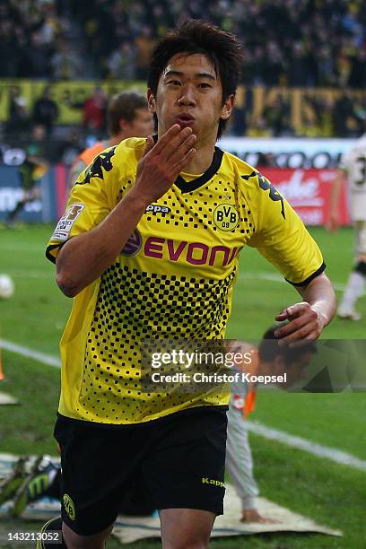 Shinji Kagawa of Dortmund celebrates the second goal during the 1. Bundesliga match between Borussia Dortmund an Borussia Moenchengladbach at Signal...