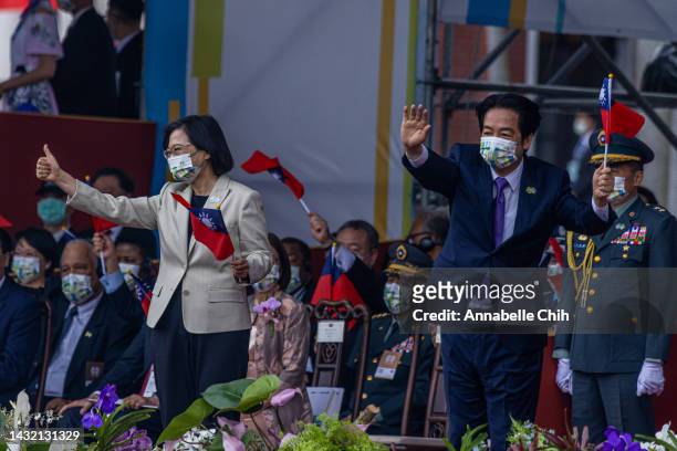 Taiwan's President Tsai Ing-wen and Taiwan's Vice President Lai Ching-te interact with the performers during the Taiwan's National Day on October 10,...