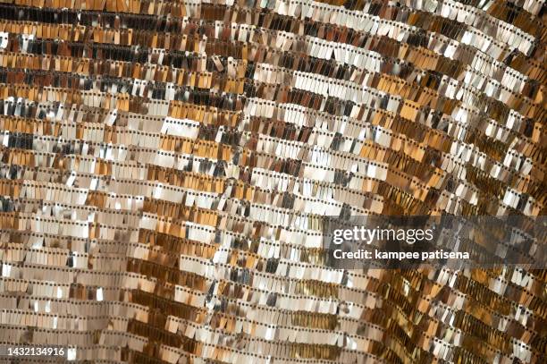 full frame shot of goldl vibrant glittering sequins background - disco costume stock pictures, royalty-free photos & images