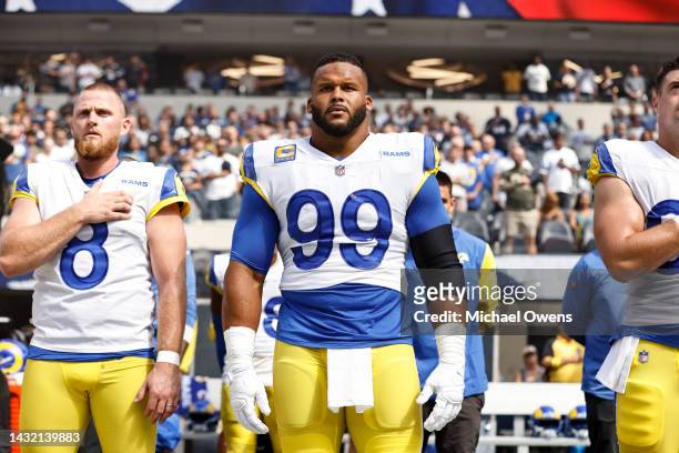 Aaron Donald of the Los Angeles Rams looks on during the national anthem prior to an NFL football game against the Dallas Cowboys at SoFi Stadium on...