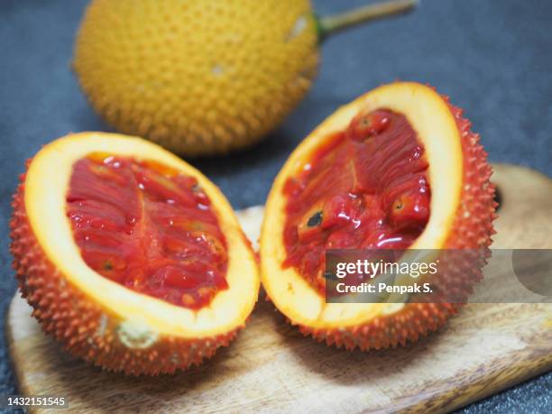 cut gac fruit - sharp stock pictures, royalty-free photos & images