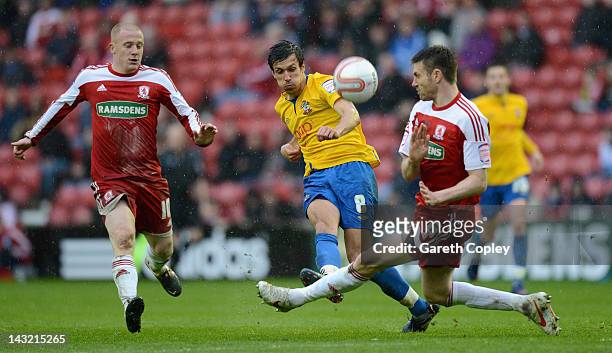 Jack Cork of Southampton shoots past Stephen McManus of Middlesborough during the npower Championship between Middlesbrough and Southampton at...