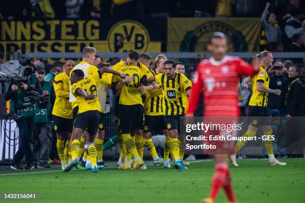 Anthony Modeste of Borussia Dortmund celebrates with his team after scoring his team's second goal during the Bundesliga match between Borussia...