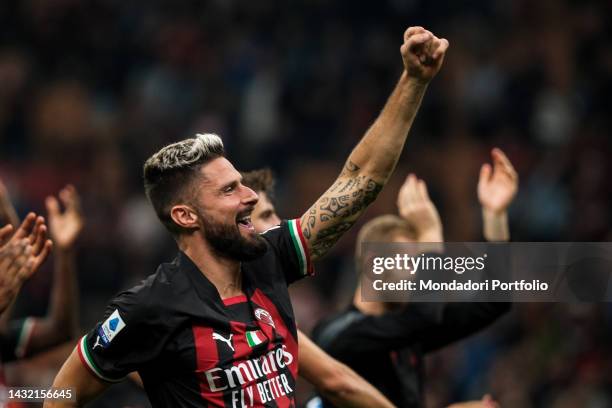 Olivier Giroud of AC Milan celebrates at the end of the Serie A football match between AC Milan and Juventus FC at San Siro stadium. Milano , October...