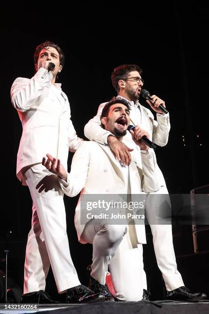 Gianluca Ginoble, Ignazio Boschetto and Piero Barone of IL VOLO perform during the benefit Concert For Victims Of Hurricane Ian at FLA Live Arena on...