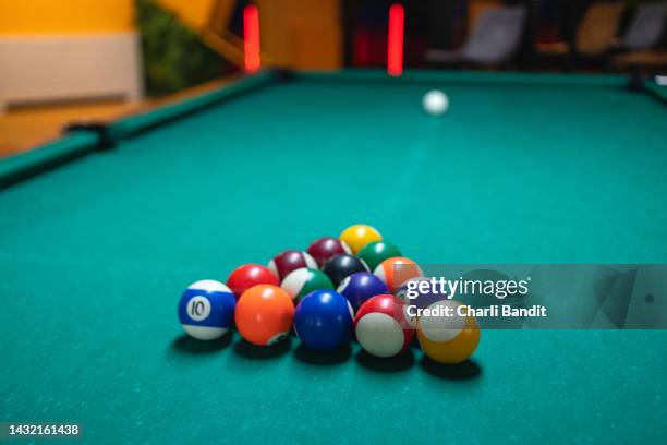 pool balls on the pool table - pool ball stock pictures, royalty-free photos & images