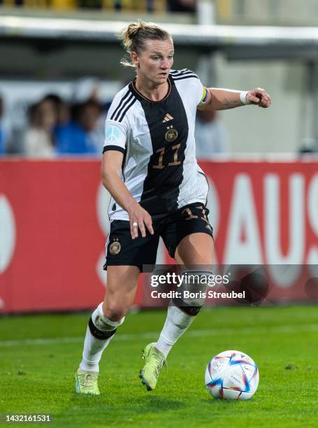 Alexandra Popp of Germany runs with the ball during the international friendly match between Germany Women's and France Women's at...