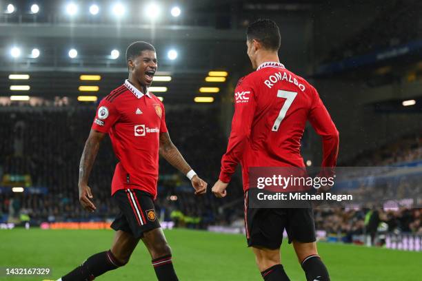 Cristiano Ronaldo of Manchester United celebrates scoring the winning goal to make it 2-1 with Marcus Rashford during the Premier League match...