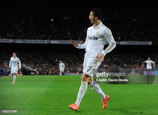Cristiano Ronaldo of Real Madrid CF celebrates after scoring his team's 2nd goal during the La Liga match between FC Barcelona and Real Madrid CF at...