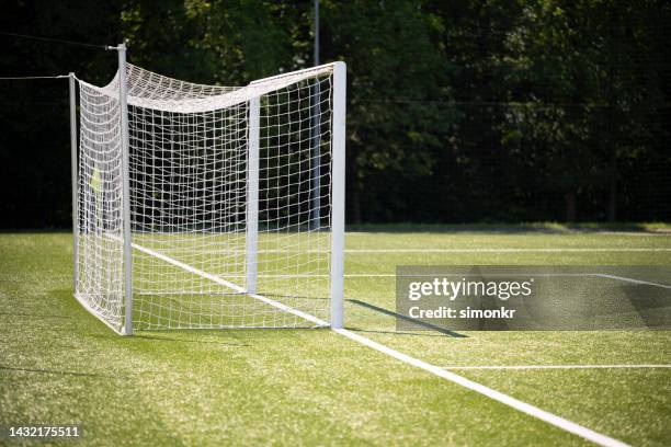 football goal post on field - goal post stock pictures, royalty-free photos & images