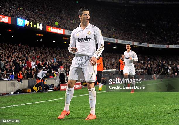 Cristiano Ronaldo of Real Madrid CF celebrates after scoring his team's 2nd goal during the La Liga match between FC Barcelona and Real Madrid CF at...