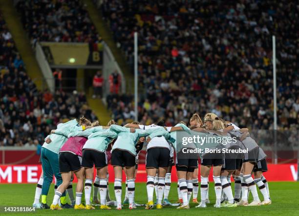 Team Germany stand in a circle prior to the international friendly match between Germany Women's and France Women's at Rudolf-Harbig-Stadion on...