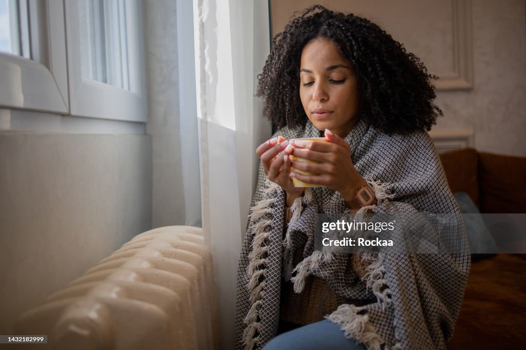 Woman feel cold in home with no heating
