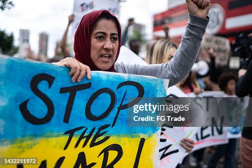 Mature woman protesting in the street Mature woman protesting in the street