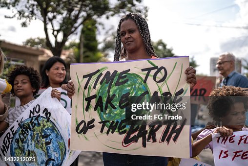 Mature woman protesting in the street