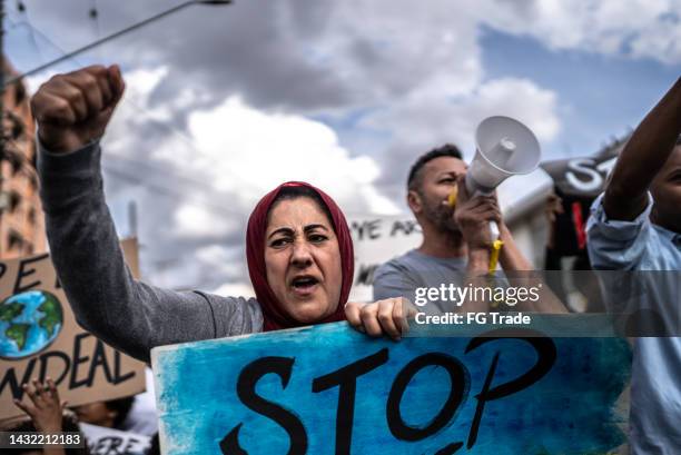 people protesting in the street - civil war poster stock pictures, royalty-free photos & images