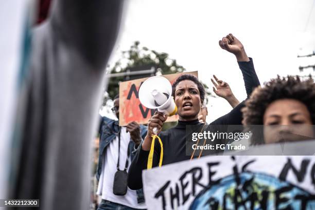 people protesting in the street - childrens justice campaign event stock pictures, royalty-free photos & images