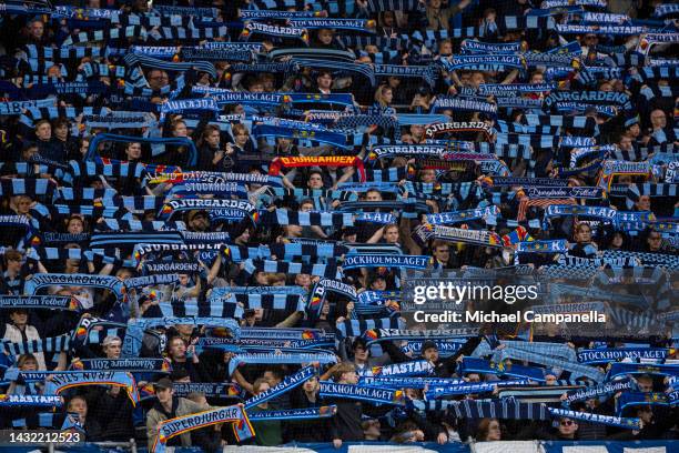 Supporters of Djurgardens IF hold up scarves durring an Allsvenskan match between Djurgardens IF and BK Hacken at Tele2 Arena on October 9, 2022 in...