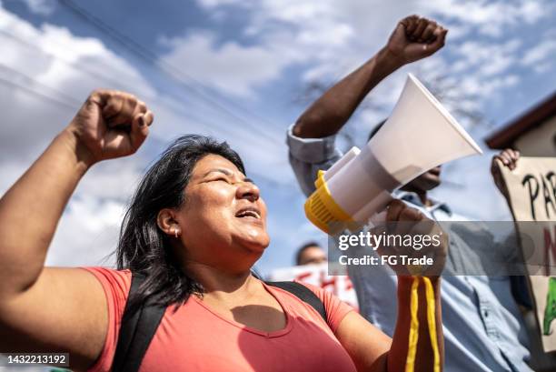 group of people protesting in the streets - defend your rights stock pictures, royalty-free photos & images