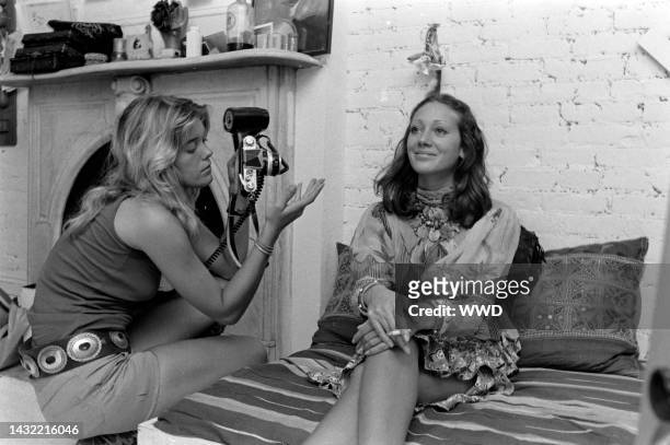Photographer Berry Berenson takes pictures of model Marisa Berenson during an interview in the photographer's live-in photo studio apartment on...