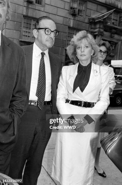 Alan Greenspan and Barbara Walters attend a service at the Church of St. Vincent Ferrer in New York City on September 14, 1983.
