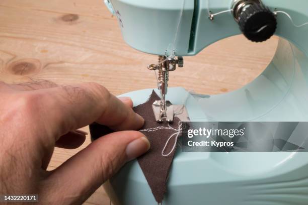 Machine With Hand 28 Hand Powered Sewing Machines Stock Photos, High-Res Pictures, and ...