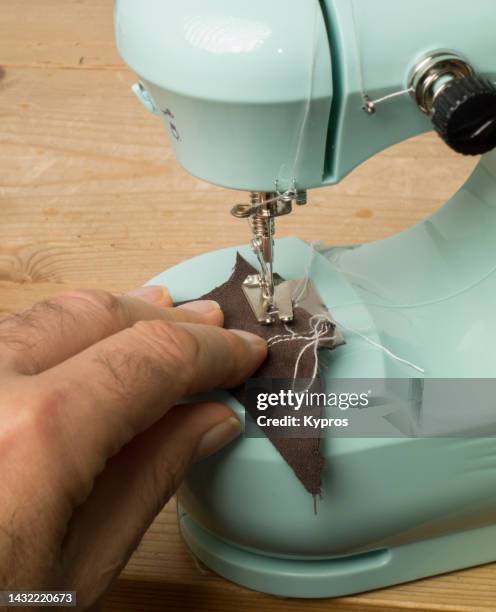 One Hand Machine 19 Hand Powered Sewing Machines Stock Photos, High-Res Pictures, and ...