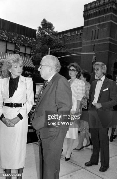 Barbara Walters and Henry Grunwald attend a service at the Church of St. Vincent Ferrer in New York City on September 14, 1983.