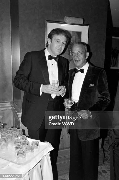 Donald J. Trump and Roy Cohn attend a party at the Ritz-Carlton Hotel in Washington, D.C., on March 20, 1983.