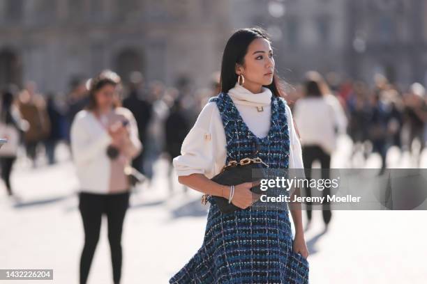 Yoyo Cao seen wearing a total Louis Vuitton look, outside Louis Vuitton during Paris Fashion Week on October 04, 2022 in Paris, France.