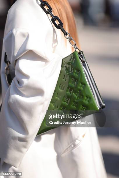 Gala Gonzalez seen wearing a green Louis Vuitton leather bag, outside Louis Vuitton during Paris Fashion Week on October 04, 2022 in Paris, France.