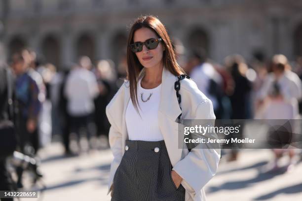 Gala Gonzalez seen wearing a green Louis Vuitton leather bag, outside Louis Vuitton during Paris Fashion Week on October 04, 2022 in Paris, France.