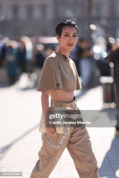 Molly Chiang seen wearing a total Louis Vuitton look, outside Louis Vuitton during Paris Fashion Week on October 04, 2022 in Paris, France.