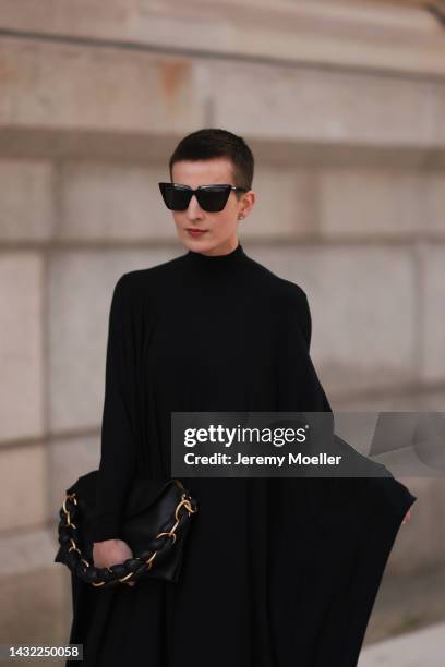 Tereza Brink wearing Balenciaga black dress, black glasses, a black Proenza Schouler bag on October 06, 2022 in Hamburg, Germany.