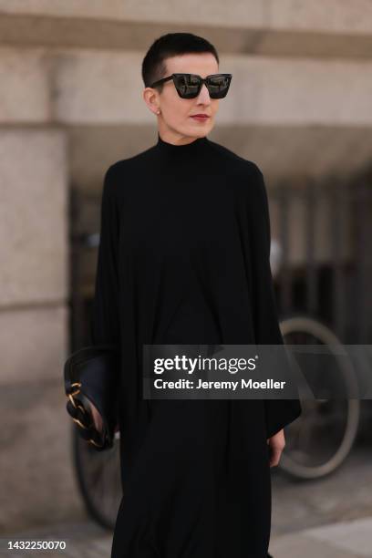 Tereza Brink wearing Balenciaga black dress, black glasses, a black Proenza Schouler bag on October 06, 2022 in Hamburg, Germany.