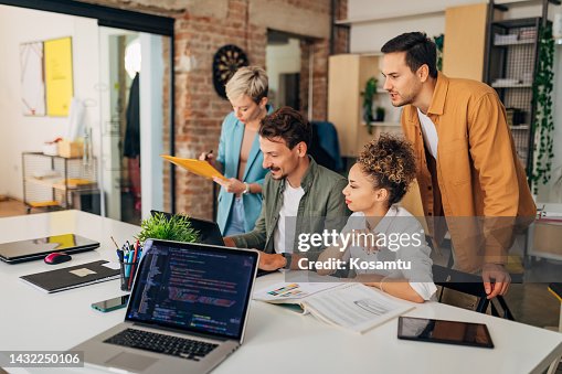 A small group of people focus on solving programming coding problems A small group of people focus on solving programming coding problems