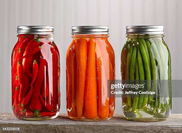 canned vegetables 2 - salmuera fotografías e imágenes de stock