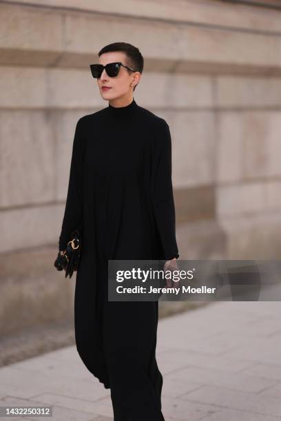 Tereza Brink wearing Balenciaga black dress, black glasses, a black Proenza Schouler bag on October 06, 2022 in Hamburg, Germany.