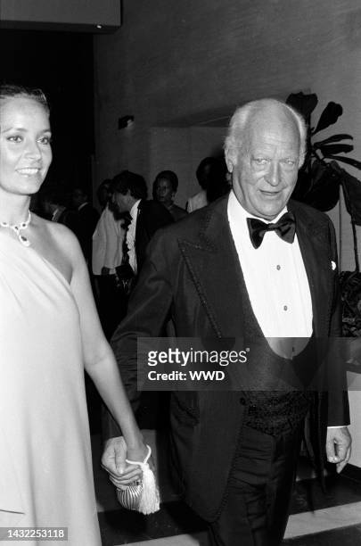 Margie Schmitz and Curd Jurgens attend an event in Monte Carlo, Monaco, on August 13, 1979.