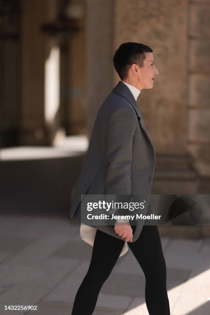 Tereza Brink wearing Bottega Veneta white leather bag and blazer, white Bottega Veneta top, Wardrobe NYC black skinny leggings on October 06, 2022 in...