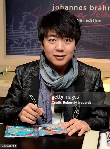 Pianist Lang Lang autographs his latest CD "Liszt My Piano Hero" at the Mont Blanc store on April 21, 2012 in Barcelona, Spain.