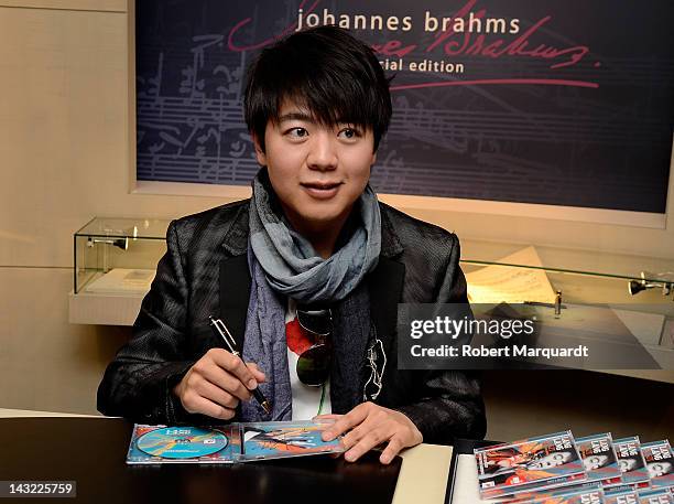 Pianist Lang Lang autographs his latest CD "Liszt My Piano Hero" at the Mont Blanc store on April 21, 2012 in Barcelona, Spain.