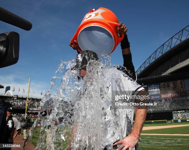 Starting pitcher Philip Humber of the Chicago White Sox is doused with water by a teammate after throwing a perfect game against the Seattle Mariners...