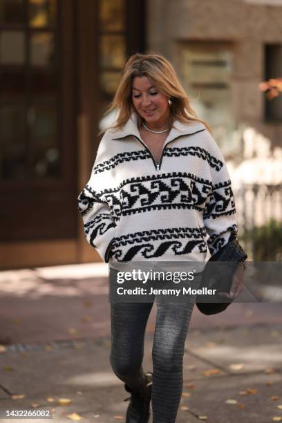 Yasmin von Schlieffen-Nannen wearing black and white Isabel Marant Etoile jacket, Bottega Veneta black leather Jodie bag, Isabel Marant grey leggings...