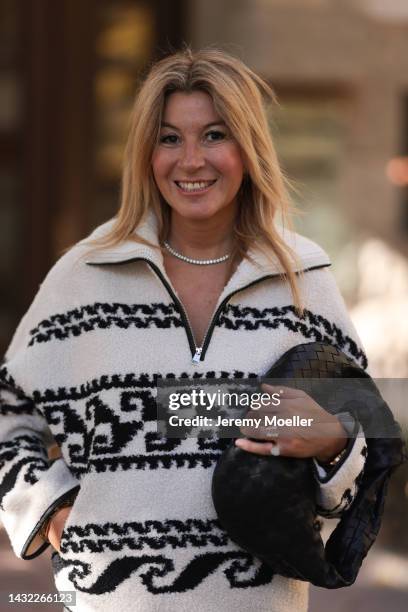 Yasmin von Schlieffen-Nannen wearing black and white Isabel Marant Etoile jacket, Bottega Veneta black leather Jodie bag on October 07, 2022 in...