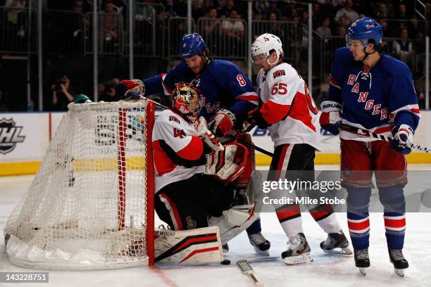 Craig Anderson of the Ottawa Senators makes a save against Brandon Prust of the New York Rangers in Game Five of the Eastern Conference Quarterfinals...