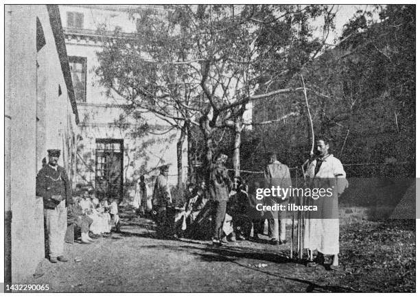 antique image: "ecole des arts et metiers" in dellys, algeria - algeria stock illustrations